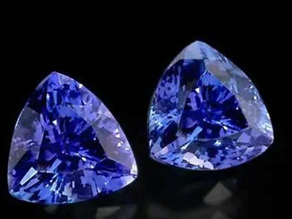Illustrative blue-violet tanzanite specimen on a neutral background