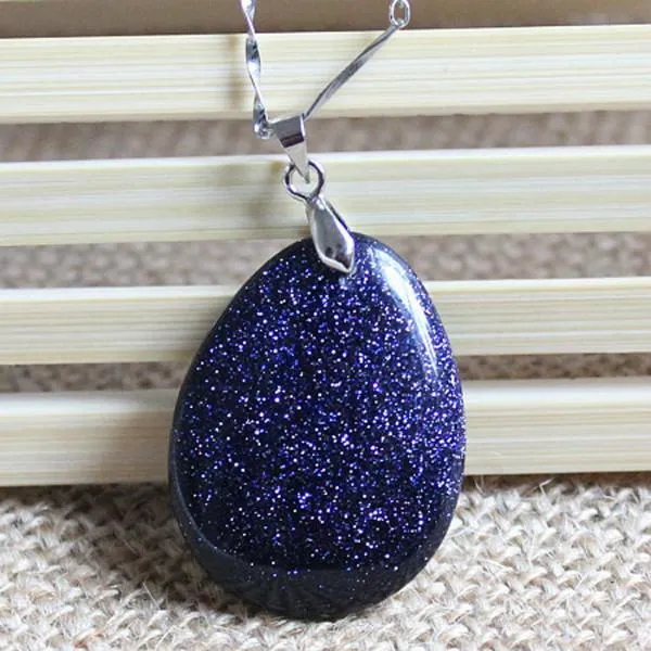 Blue Goldstone pendant with evenly distributed glittering inclusions